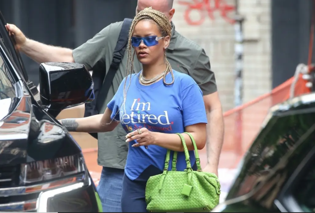 Rihanna's Fans Speculate On New Music As Singer Sports "Retired" Shirt